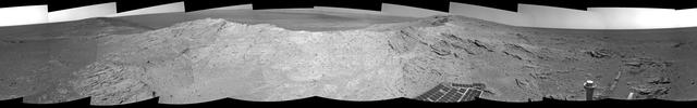 NASA Mars Exploration Rover capturde this 360-degree view near the ridgeline of Endeavour Crater western rim. The center is southeastward. Rocks on the slope to the right of center are in an outcrop area targeted for the rover to study.