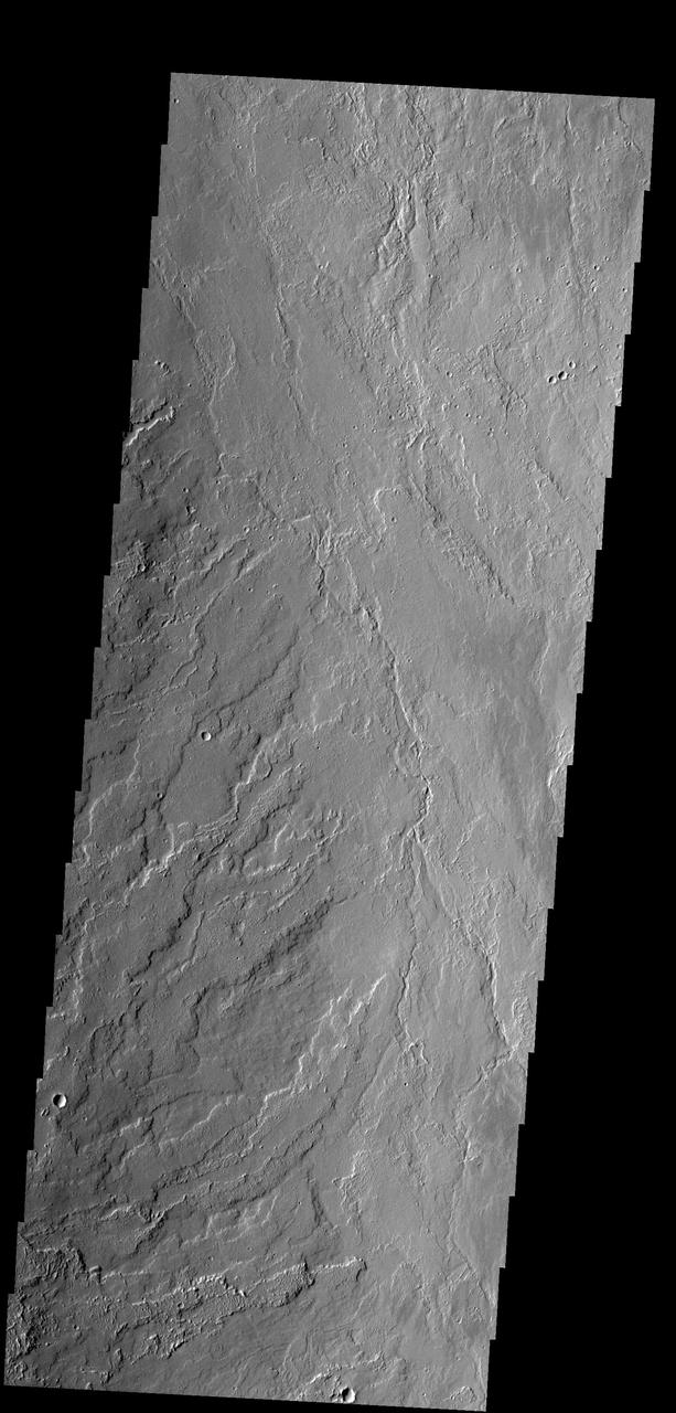 This image shows lava flows that originated at Olympus Mons as seen by NASA 2001 Mars Odyssey spacecraft.
