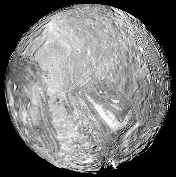 Uranus icy moon Miranda is seen in this image from Voyager 2 on January 24, 1986.  https://photojournal.jpl.nasa.gov/catalog/PIA18185