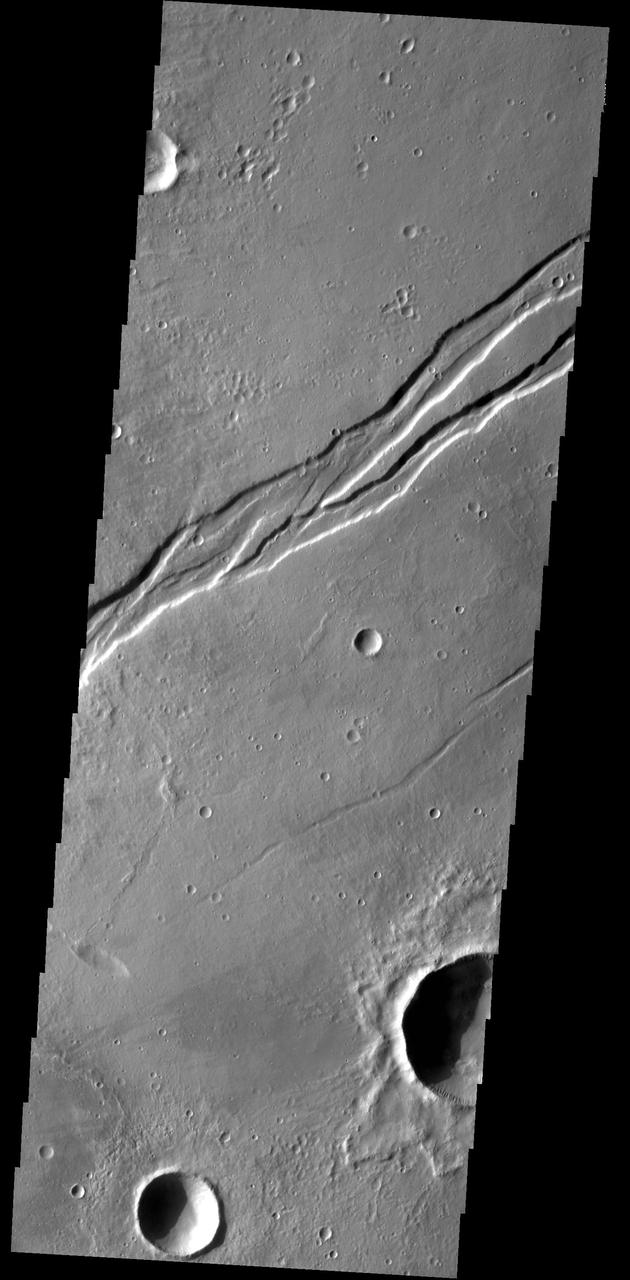 This complex graben is part of Labeatis Fossae. This image was captured by NASA 2001 Mars Odyssey spacecraft.