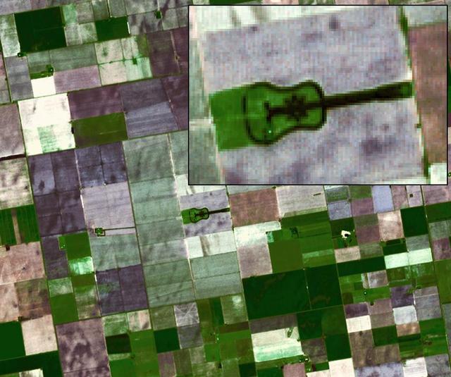 Located in the fertile agricultural region of Argentina Pampas is a guitar-shaped forest made up of cypress and eucalyptus trees as seen by NASA Terra spacecraft.