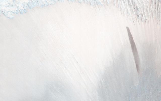 NASA image: A Surprise Landslump in Melas Chasma