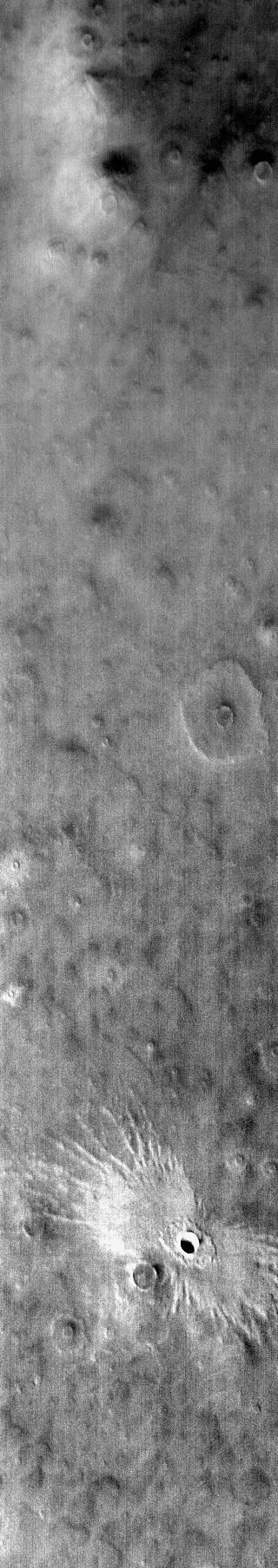 The ejecta pattern around this northern plains crater is termed butterfly for its similarity to butterfly wings, as shown in this image captured by NASA 2001 Mars Odyssey spacecraft.