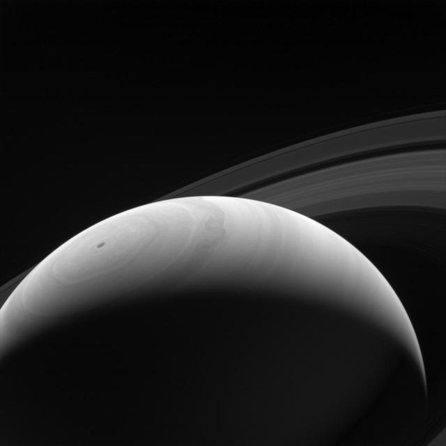 A new day dawns on Saturn as the part of the planet is seen emerging once more into the Sun light by NASA Cassini orbiter. With an estimated rotation period of 10 hours and 40 minutes, Saturn days and nights are much shorter than those on Earth.
