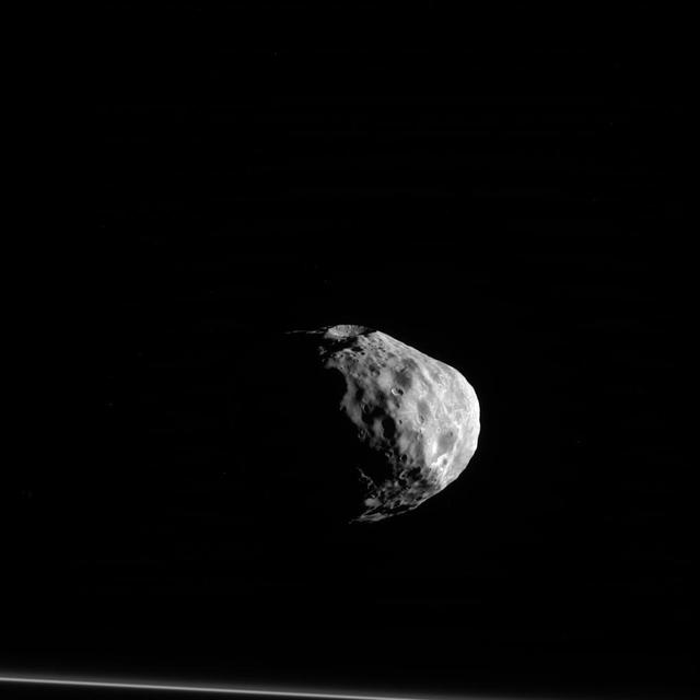 Janus (111 miles or 179 kilometers across) seems to almost stare off into the distance, contemplating deep, moonish thoughts as the F ring stands by at the bottom of this image.  From this image, it is easy to distinguish Janus' shape from that of a sphere. Many of Saturn's smaller moons have similarly irregular shapes that scientists believe may give clues to their origins and internal structure. Models combining the dynamics of this moon with its shape imply the existence of mass inhomogeneities within Janus. This would be a surprising result for a body the size of Janus. By studying more images of Janus, scientists may be able confirm this finding and determine just how complicated the internal structure of this small body is.  This image is roughly centered on the side of Janus which faces away from Saturn. North on Janus is up and rotated 3 degrees to the right. The image was taken in visible light with the Cassini spacecraft narrow-angle camera on March 28, 2012.  The view was obtained at a distance of approximately 54,000 miles (87,000 kilometers) from Janus. Image scale is 1,700 feet (520 meters) per pixel.  http://photojournal.jpl.nasa.gov/catalog/PIA18299