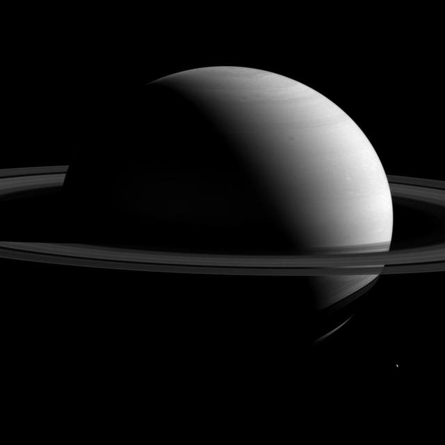 NASA Cassini spacecraft captured Saturn, around 10 times the diameter of Earth, dwarfs it retinue of moons. Tethys is seen here at lower right.  http://photojournal.jpl.nasa.gov/catalog/PIA18350
