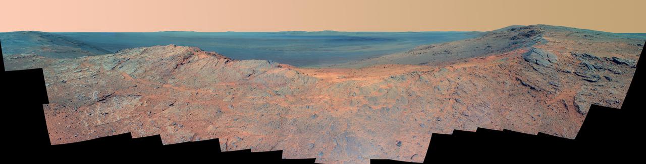 This false-color scene from the panoramic camera Pancam on NASA Mars Exploration Rover Opportunity catches Pillinger Point, on the western rim of Endeavour Crater, in the foreground.