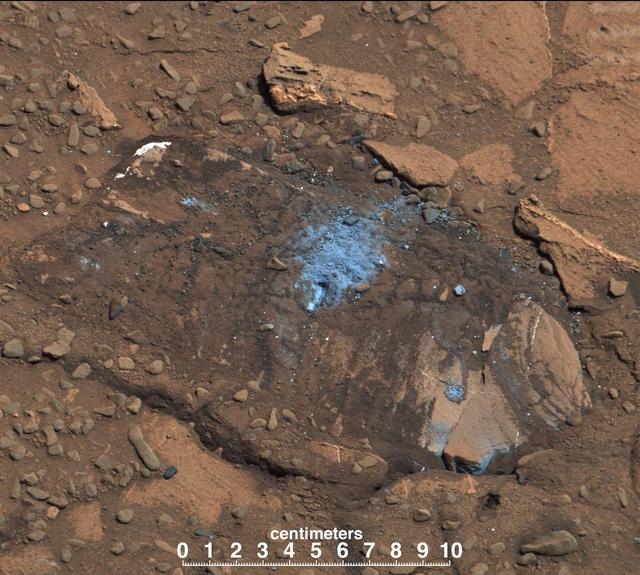 The Bonanza King rock on Mars, pictured here, was tapped by the drill belonging to NASA Mars rover Curiosity. The tapping resulted in sand piling up on the rock after drilling, showing the rock was not firmly in place.