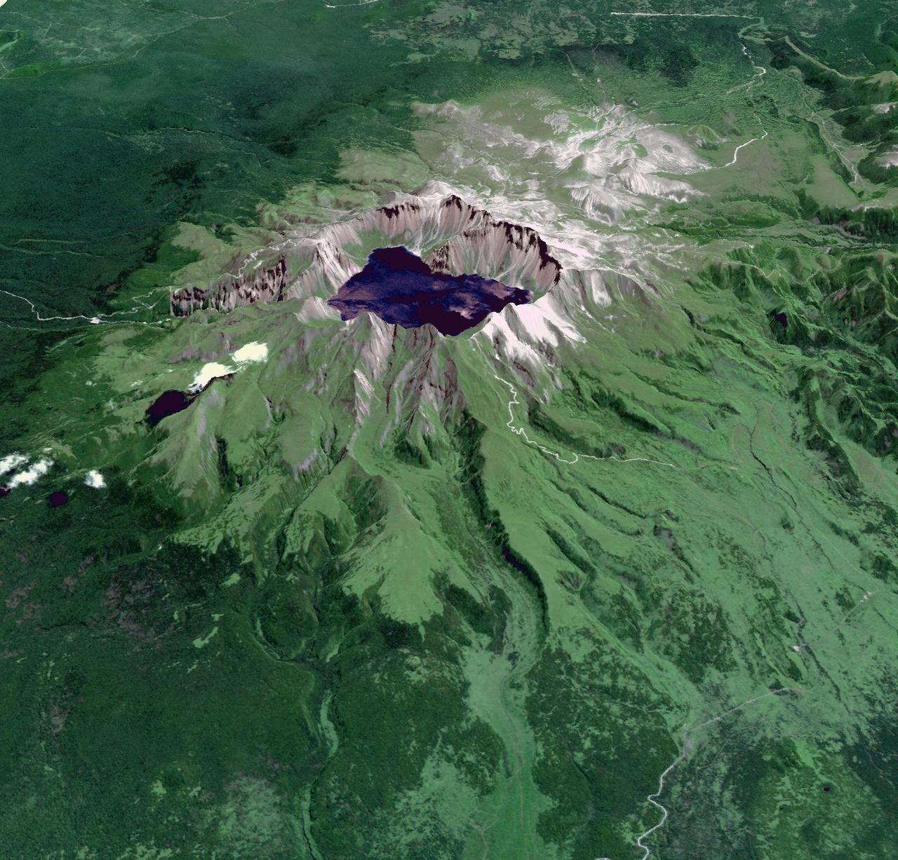 This image from NASA Terra spacecraft shows Baektu Mountain, an active volcano on the border between North Korea and China. Rising to 2744 m, its summit caldera is filled with a crater lake, Heaven Lake.