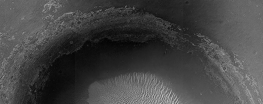 This crater, seen NASA Mars Reconnaissance Orbiter, is located in Meridiani Planum, about 20-kilometers northwest of where NASA Opportunity rover landed in 2004 and about 42-kilometers northwest of Endeavour Crater rim.