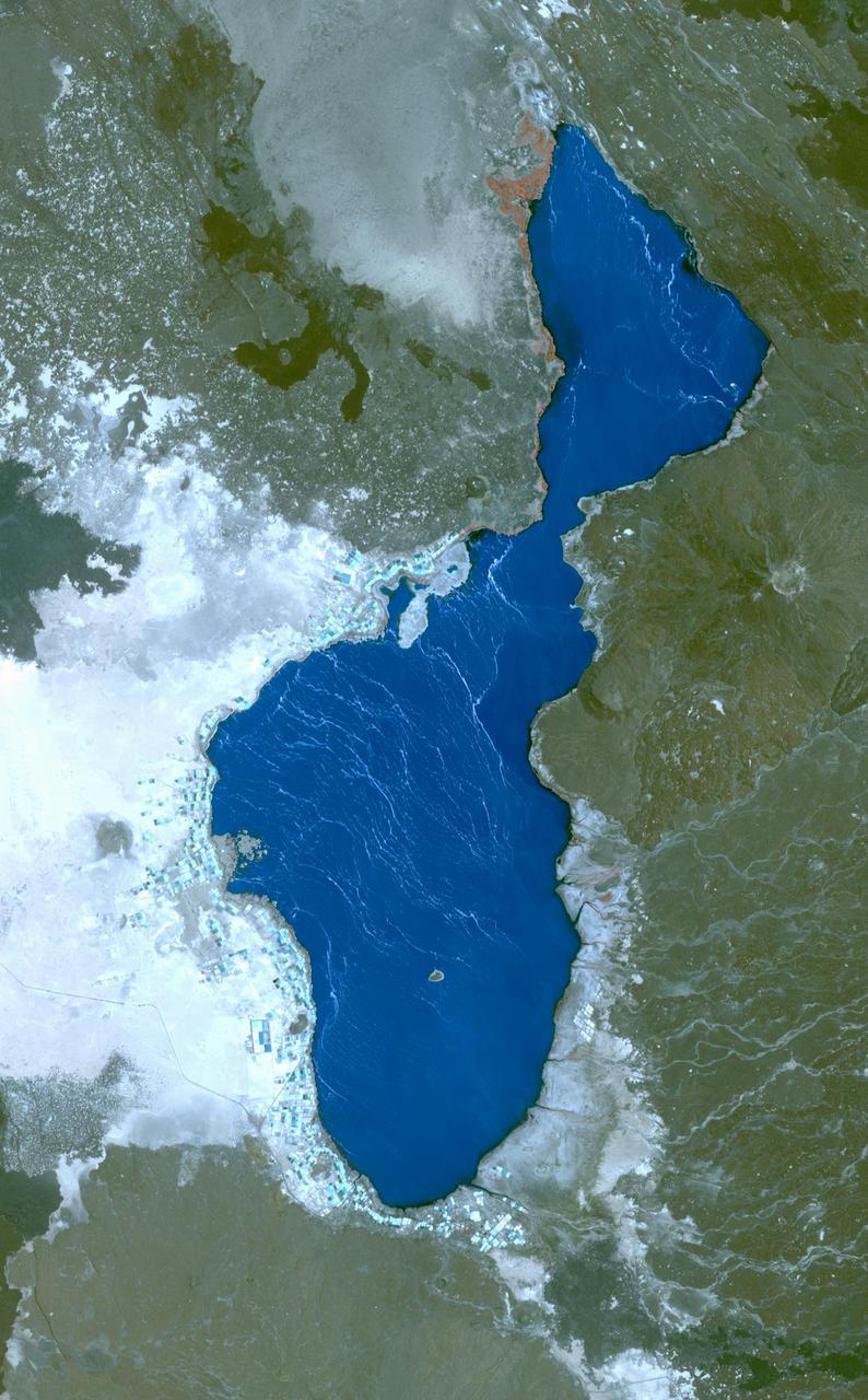 Lake Afrera is a hypersaline lake located in the Danakil Depression in northern Ethiopia where rock salt has been mined for centuries. This image was acquired by NASA Terra spacecraft.