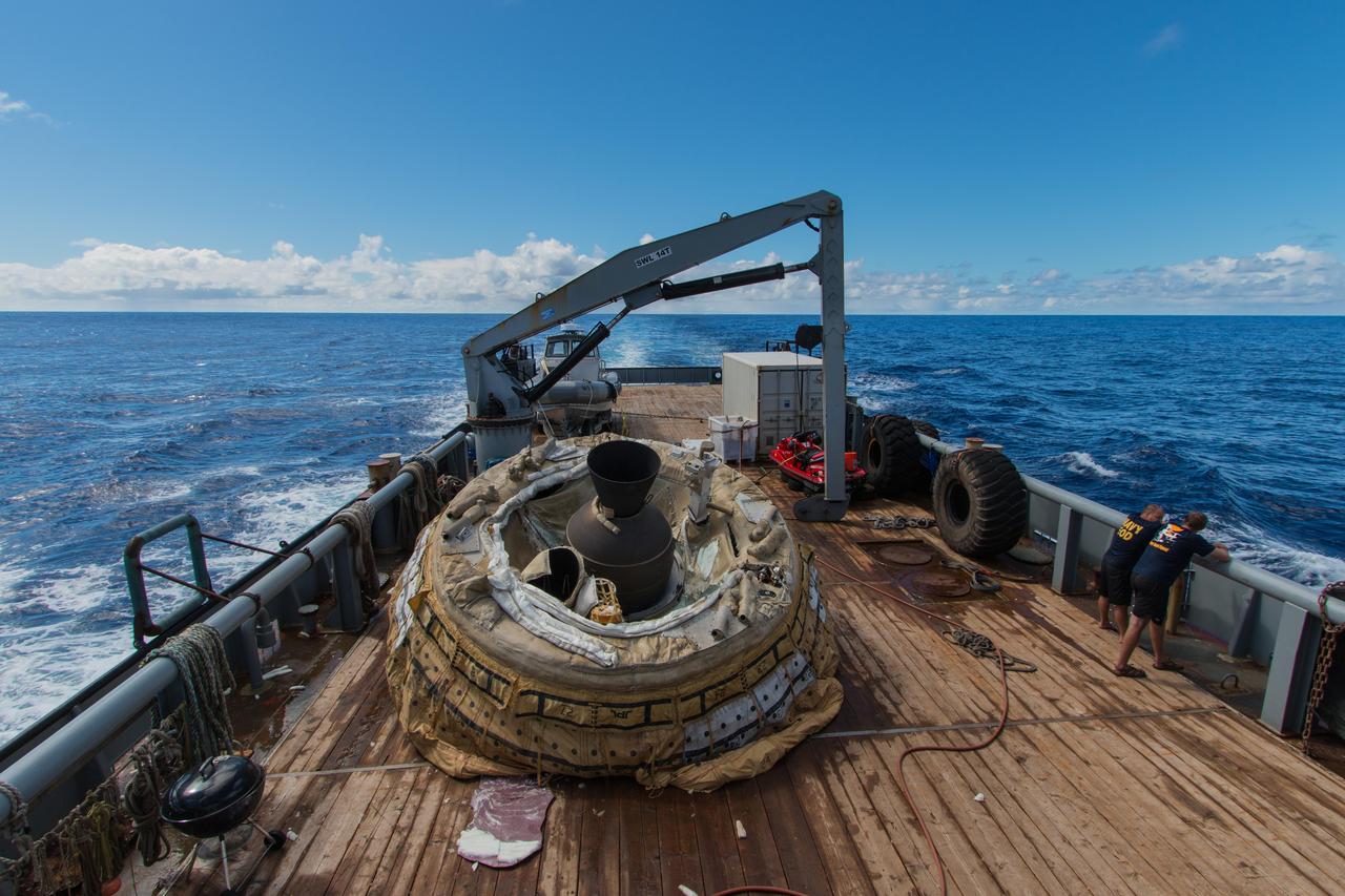 The first flown test vehicle of NASA Low-Density Supersonic Decelerator project relaxes aboard the recovery vessel Kahana.