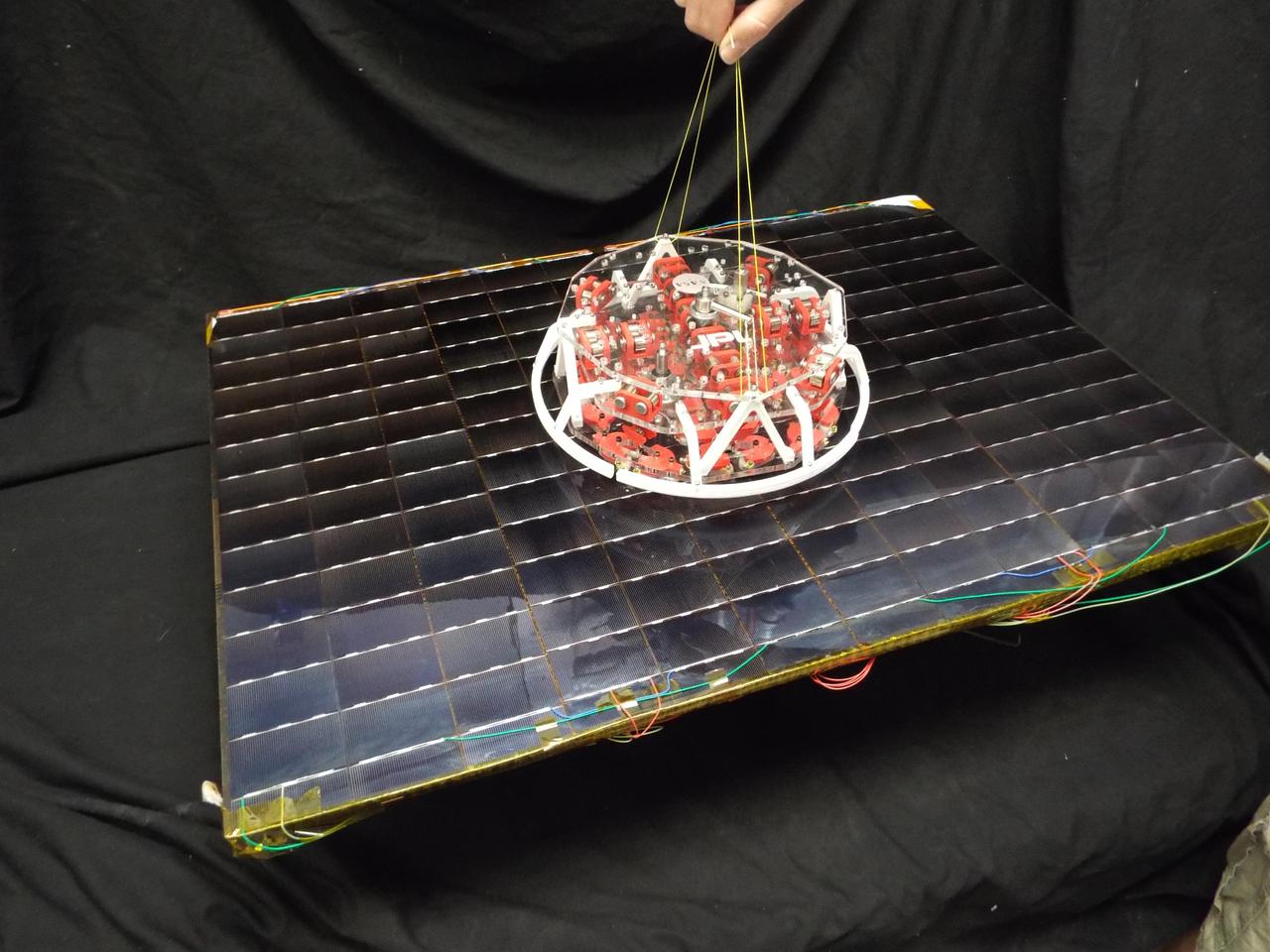 Scientists at NASA Jet Propulsion Laboratory have developed a tool for grappling non-cooperative objects that incorporates gecko-like adhesives. The adhesives are reusable and can be turned on and off.