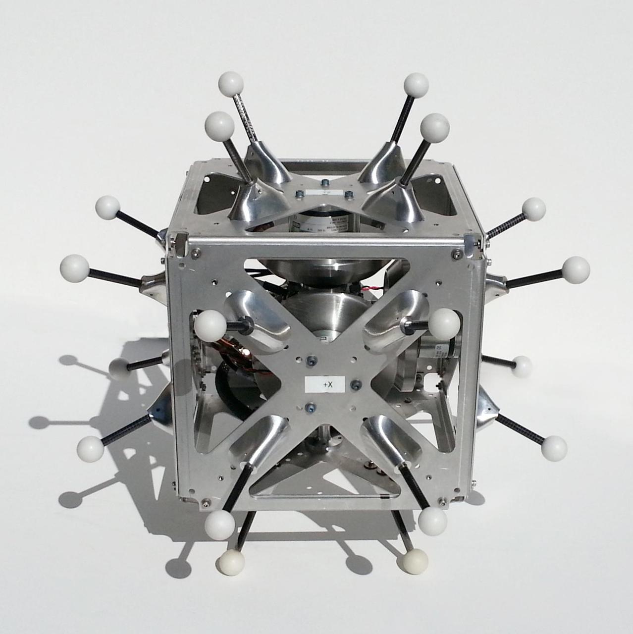 This is a hopping/tumbling robot called Hedgehog that scientists at NASA Jet Propulsion Laboratory will test on a parabolic aircraft flight.