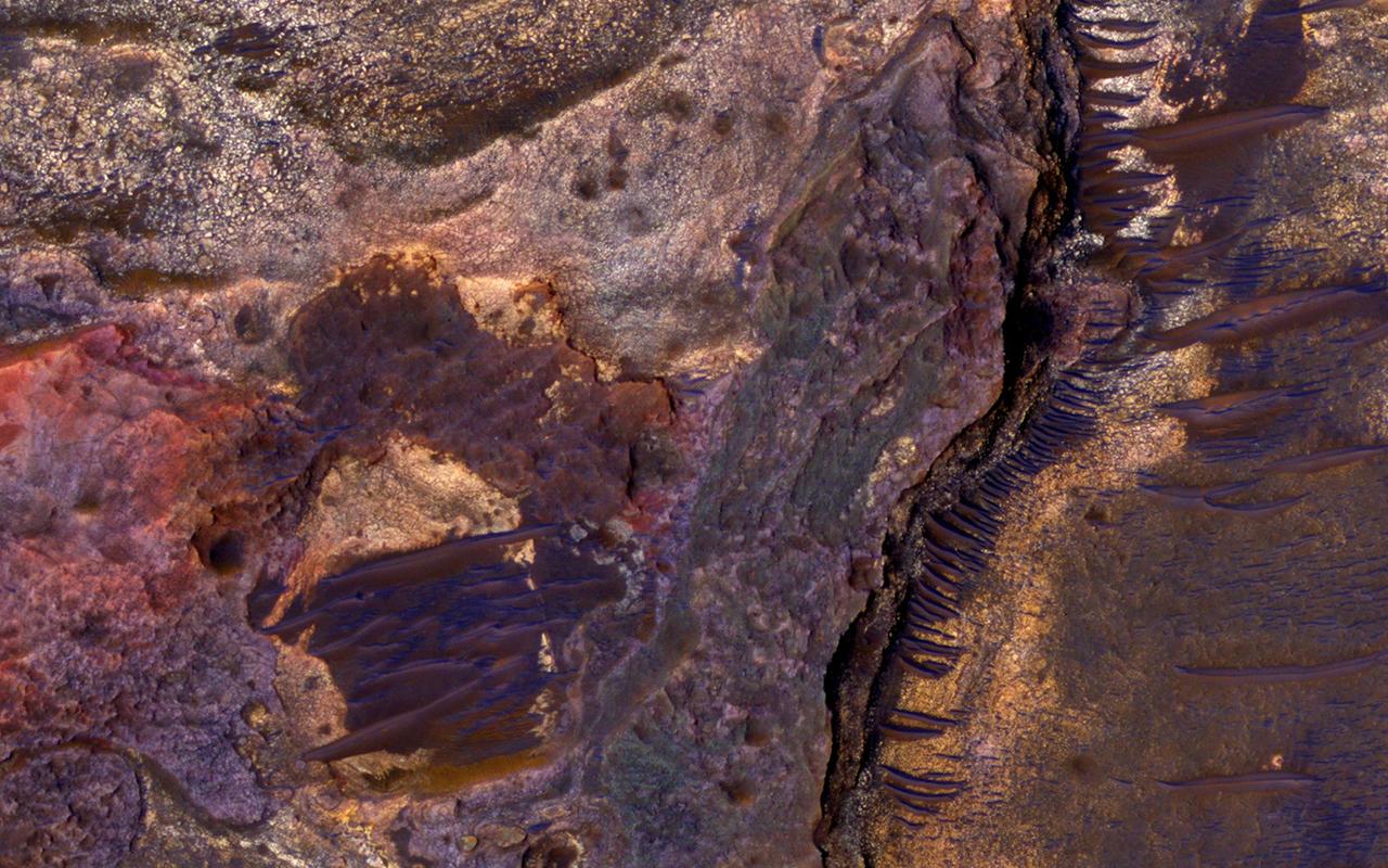 This image from NASA Mars Reconnaissance Orbiter covers layered sedimentary rocks on the floor of an impact crater north of Eberswalde Crater. There may have been a lake in this crater billions of years ago.