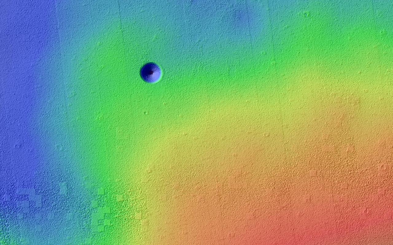 Pavonis Mons is a giant shield volcano similar to although larger than those on the Big Island of Hawaii. This image is from NASA Mars Reconnaissance Orbiter.