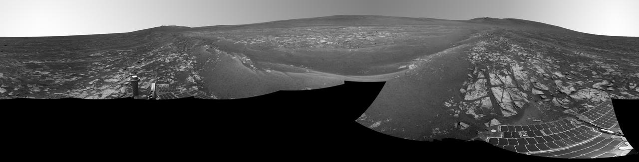 This July 29, 2014, panorama combines several images from the navigation camera on NASA Mars Exploration Rover Opportunity to show the rover surroundings after surpassing 25 miles 40.23 kilometers of total driving on Mars.