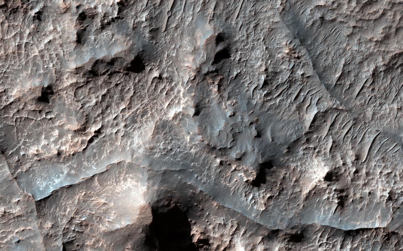 Eridania Basin, located at the head of Maadim Vallis, has mounting geomorphic and spectral evidence that it may have been the site of an ancient inland sea. This image is from NASA Mars Reconnaissance Orbiter.