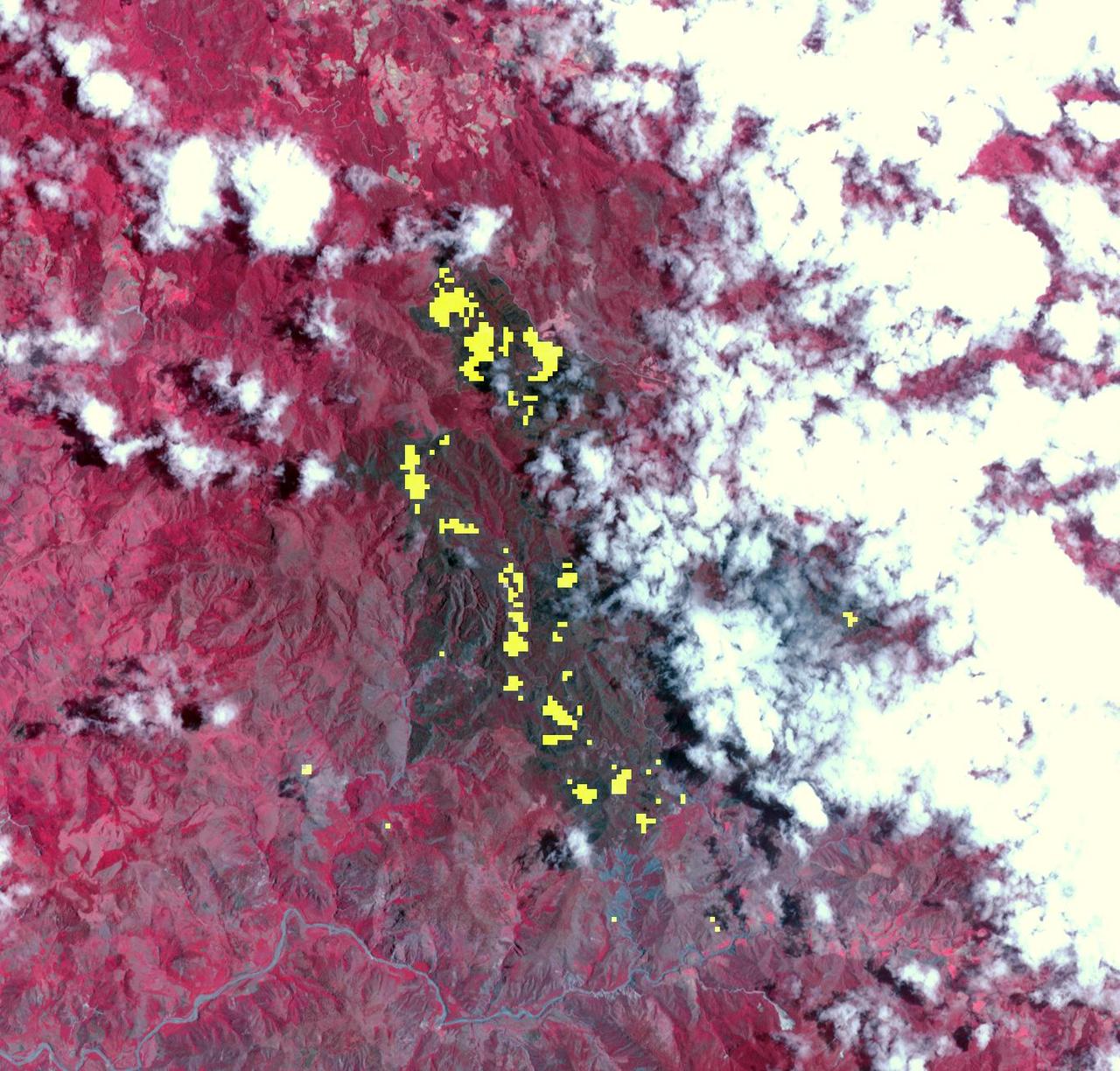 NASA Terra spacecraft captured this thermal infrared view of the spread of the forest fire in Valle Nuevo National Park near Costanza, Dominican Republic.
