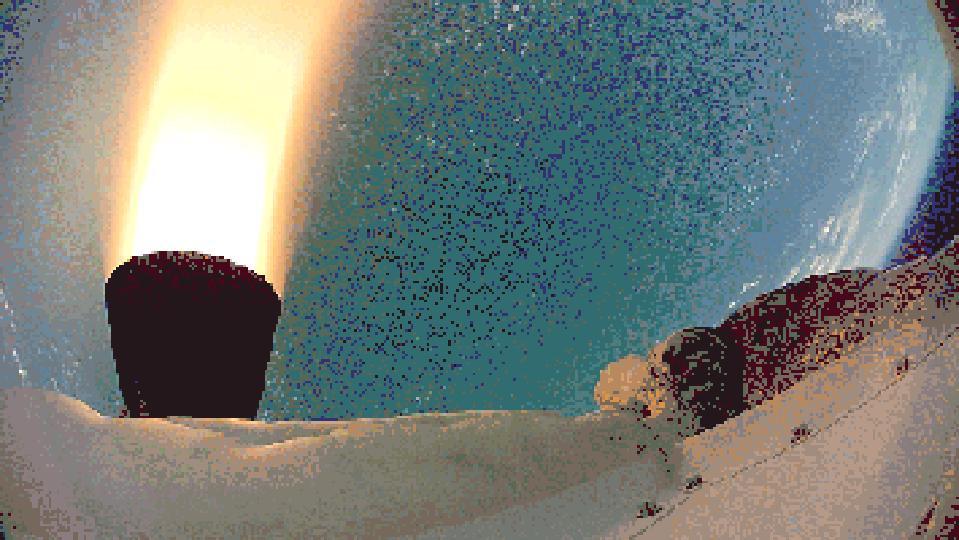 This frame from a video clip shows rockets fired by the test vehicle for NASA Low-Density Supersonic Decelerator project.