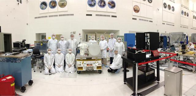 NASA Optical PAyload for Lasercomm Science OPALS integration and test team is seen at NASA Jet Propulsion Laboratory prior to OPALS shipment to Kennedy Space Center.