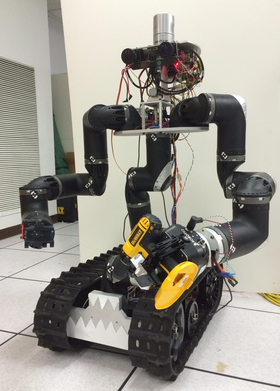 The Surrogate robot Surge, built at NASA Jet Propulsion Laboratory in Pasadena, CA., is being developed in order to extend humanity reach into hazardous environments to perform tasks such as using environmental test equipment.