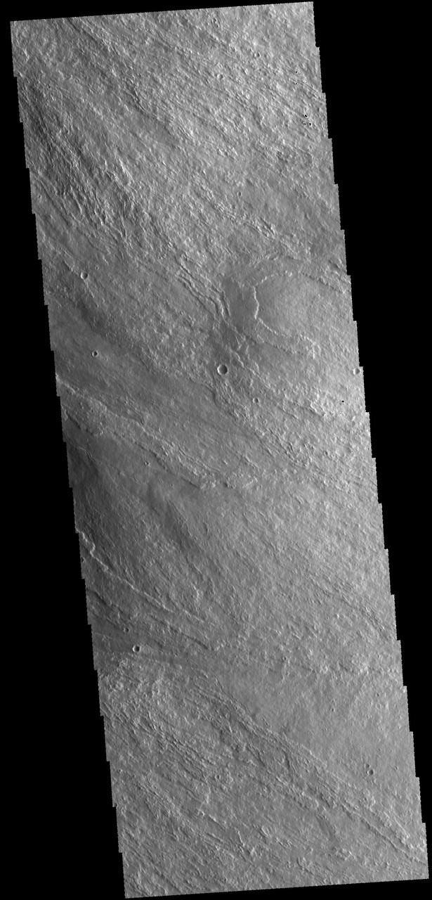 The lava flows in this image captured by NASA 2001 Mars Odyssey spacecraft are located on the eastern flank of Olympus Mons.