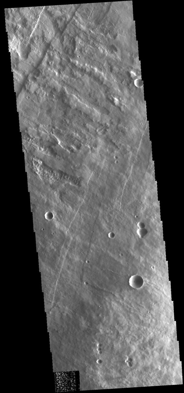 This image captured by NASA 2001 Mars Odyssey spacecraft shows part of the western flank of Pavonis Mons.