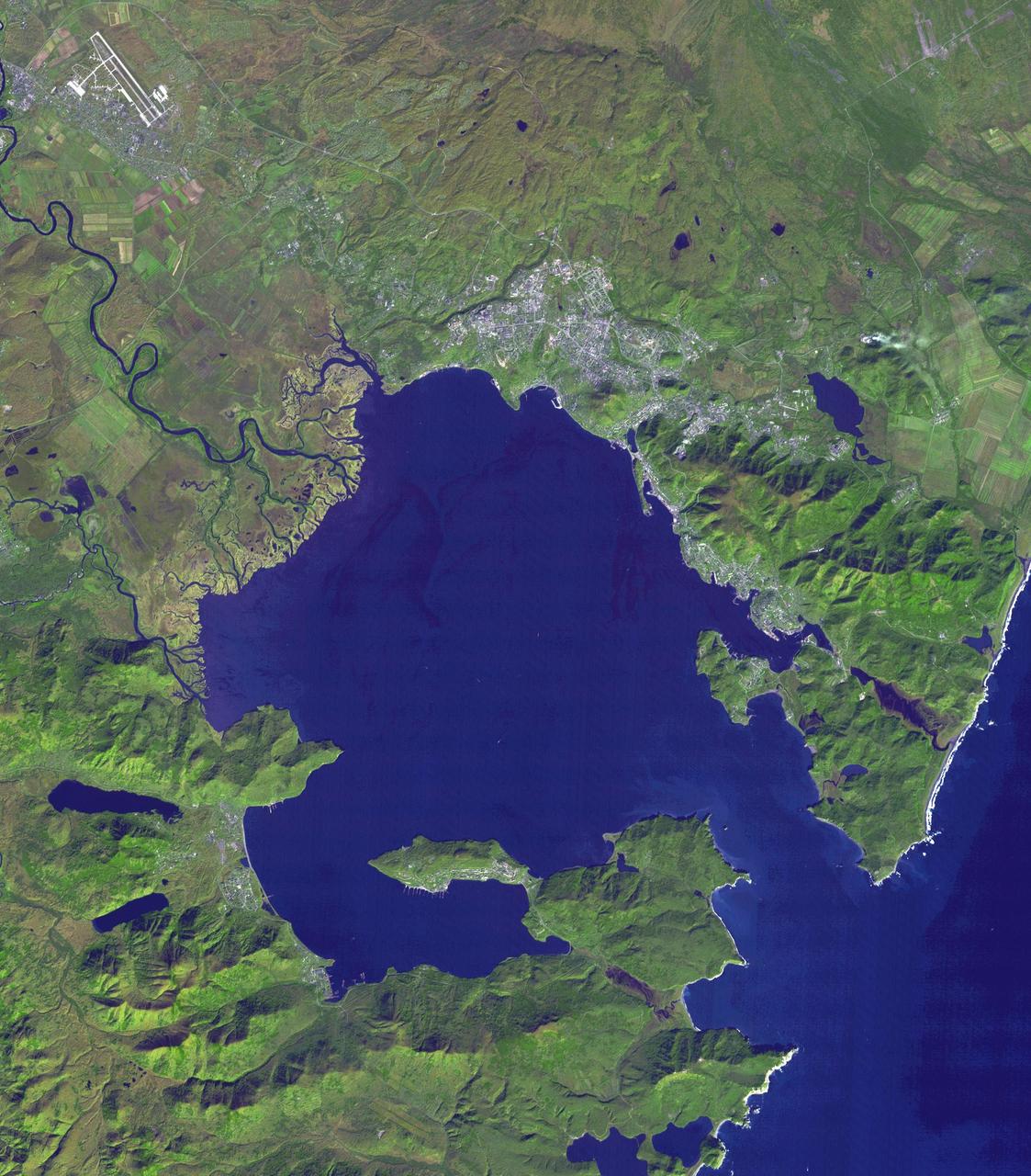 This image from NASA Terra spacecraft shows Petropavlovsk-Kamchatsky P-K, which is the administrative, cultural, scientific and economic center of Kamchatka Krai, Russia on the Kamchatka Peninsula.