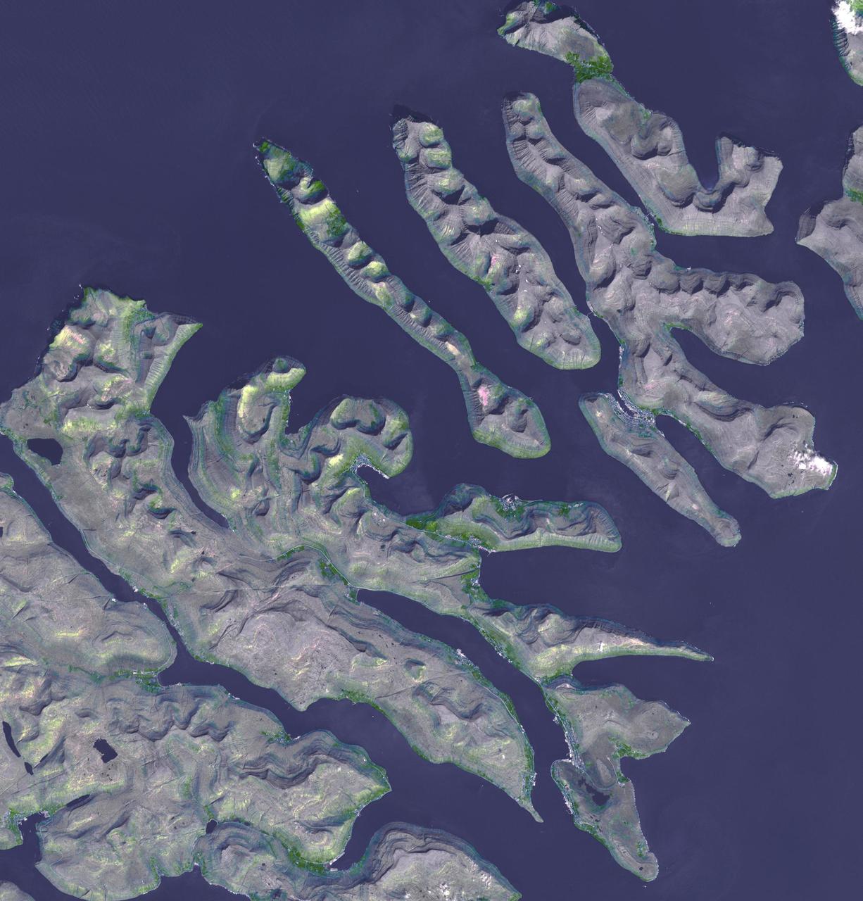 This image from NASA Terra spacecraft shows the Faroe Islands, an archipelago and autonomous country within the Kingdom of Denmark, comprising 18 major islands.