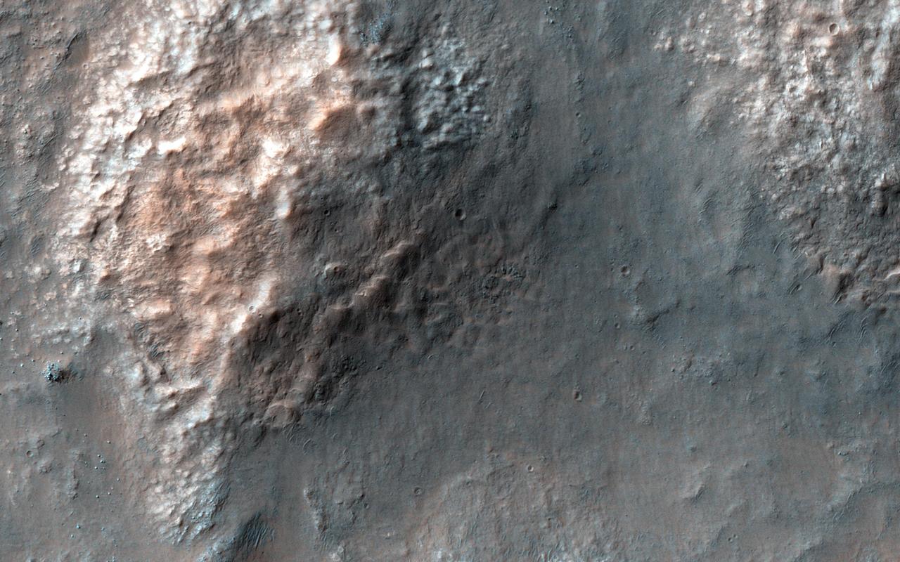 Eridania is the name of topographically enclosed basin located in the Southern highlands of Mars that has been suggested to be the site of a large ancient lake or inland sea. This image is from NASA Mars Reconnaissance Orbiter.