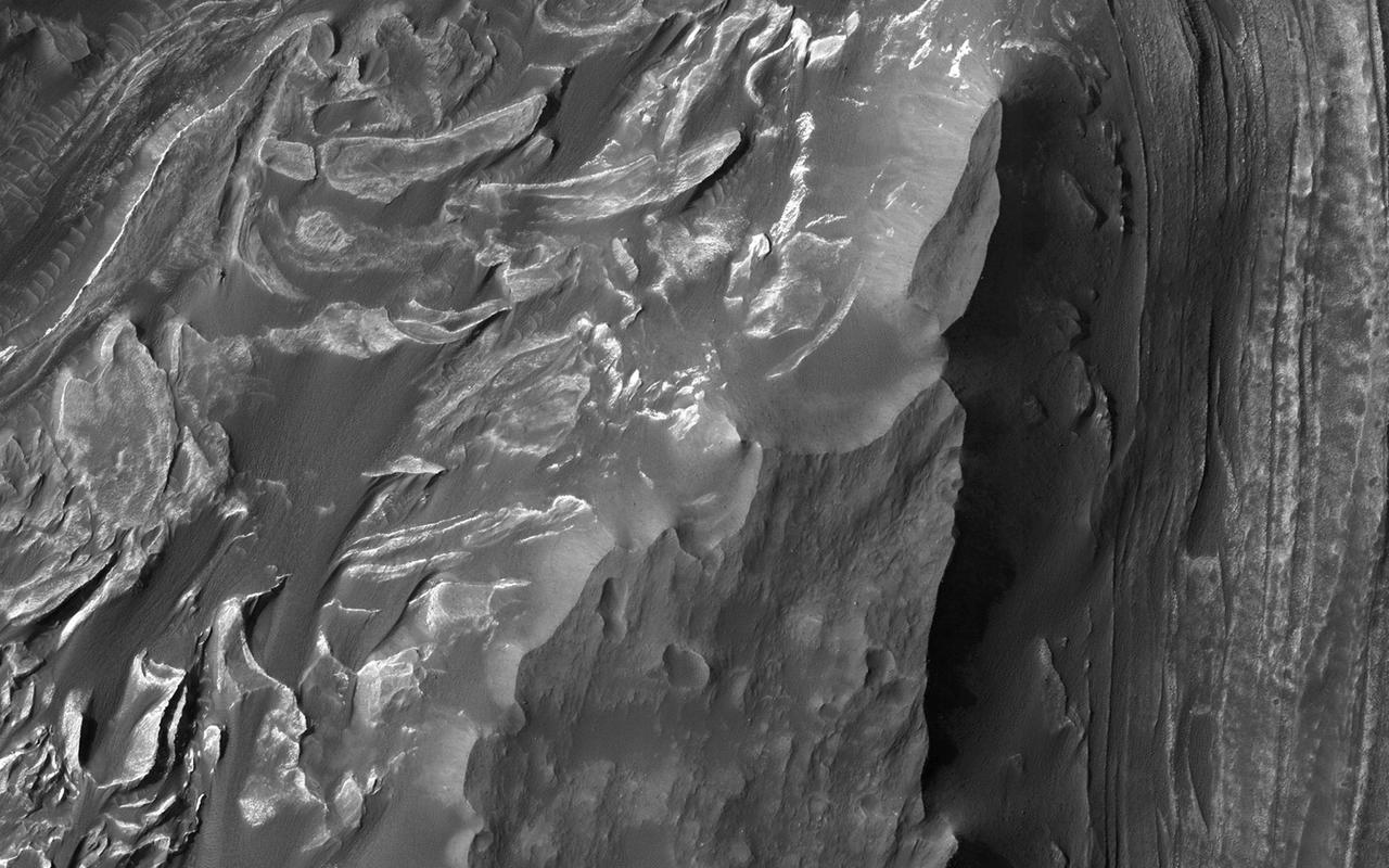 Melas Chasma is the widest segment of the Valles Marineris canyon, and is an area where NASA Mars Reconnaissance Orbiter has detected the presence of sulfates.