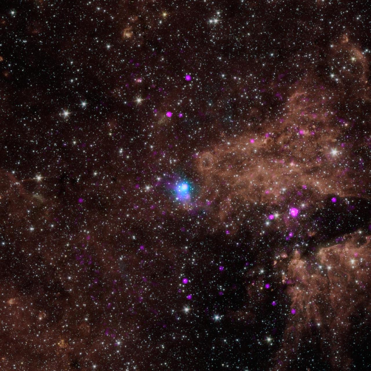 The blue dot in this image marks the spot of an energetic pulsar -- the magnetic, spinning core of star that blew up in a supernova explosion. NASA NuSTAR discovered the pulsar by identifying its telltale pulse.