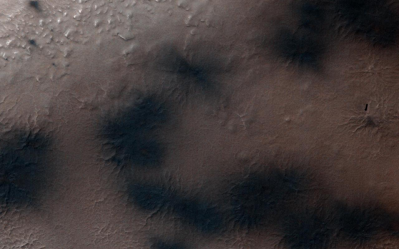 This image, acquired by NASA Mars Reconnaissance Orbiter, shows there are a few more fans on the ridge as spring activity progresses in Inca City.  In Inca City another week has passed, and there are a few more fans on the ridge. We are studying the sequence of spring activity with the help of citizen scientists at the Planetfour website, sponsored by Zooniverse.  Citizens of planet Earth log on and identify and measure fans and blotches in the South polar region of Mars imaged by HiRISE. With their help we can study the polar weather by looking at how the fan directions change through the spring.  We see how the number of fans and blotches depends on the thickness of the ice layer and how high the sun is in the sky.  http://photojournal.jpl.nasa.gov/catalog/PIA18894