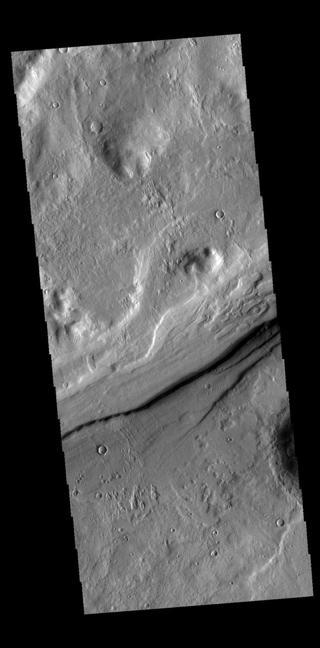 This image captured by NASA 2001 Mars Odyssey spacecraft shows a small section of Reull Vallis.