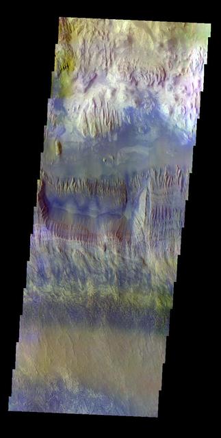 The THEMIS VIS camera contains 5 filters. The data from different filters can be combined in multiple ways to create a false color image. This false color image captured by NASA 2001 Mars Odyssey spacecraft shows part of Hebes Chasma.