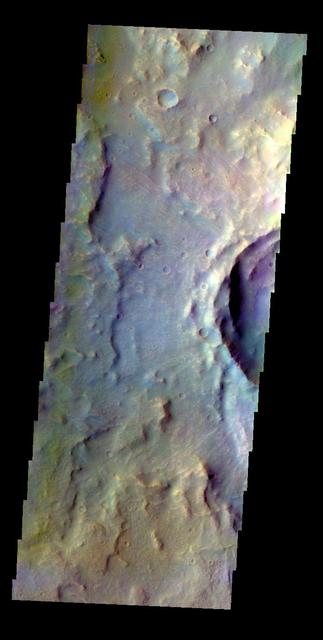 The THEMIS VIS camera contains 5 filters. The data from different filters can be combined in multiple ways to create a false color image. This false color image from NASA 2001 Mars Odyssey spacecraft shows part of an unnamed crater in Tyrrhena Terra.