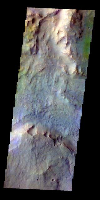 The THEMIS VIS camera contains 5 filters. The data from different filters can be combined in multiple ways to create a false color image. This false color image from NASA 2001 Mars Odyssey spacecraft shows part of Daga Vallis on Eos Mensa.