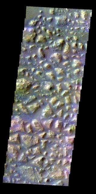 The THEMIS VIS camera contains 5 filters. The data from different filters can be combined in multiple ways to create a false color image. This false color image from NASA 2001 Mars Odyssey spacecraft shows part of Atlantis Chaos.