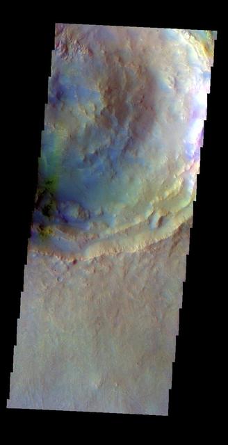 The THEMIS VIS camera contains 5 filters. The data from different filters can be combined in multiple ways to create a false color image. This false color image from NASA 2001 Mars Odyssey spacecraft shows part of Calahorra Crater in Chryse Planitia.