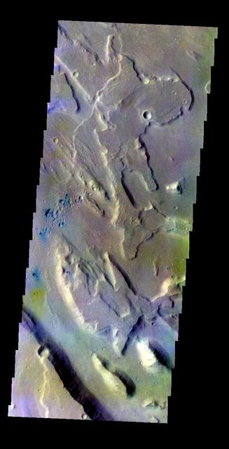 The THEMIS VIS camera contains 5 filters. The data from different filters can be combined in multiple ways to create a false color image. This false color image from NASA 2001 Mars Odyssey spacecraft shows part of of Ares Vallis.