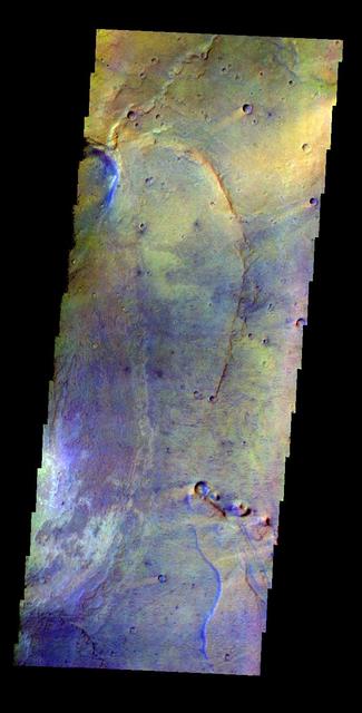The THEMIS VIS camera contains 5 filters. The data from different filters can be combined in multiple ways to create a false color image. This false color image from NASA 2001 Mars Odyssey spacecraft shows part of Nili Patera.