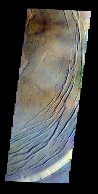 The THEMIS VIS camera contains 5 filters. The data from different filters can be combined to create a false color image. This false color image from NASA 2001 Mars Odyssey spacecraft shows part of the caldera at the summit of Olympus Mons.