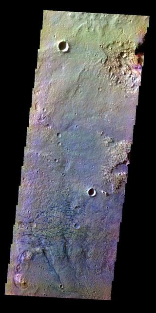 The THEMIS VIS camera contains 5 filters. The data from different filters can create a false color image. This false color image from NASA 2001 Mars Odyssey spacecraft shows part of the floor of Schaeberle Crater, including small dunes.