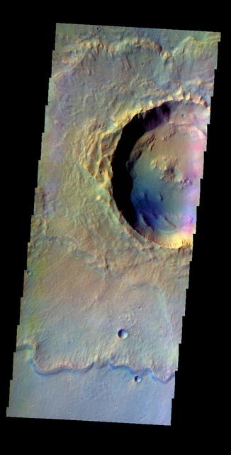 The THEMIS VIS camera contains 5 filters. The data from different filters can be combined in multiple ways to create a false color image. This false color image from NASA 2001 Mars Odyssey spacecraft shows Makhambet Crater.