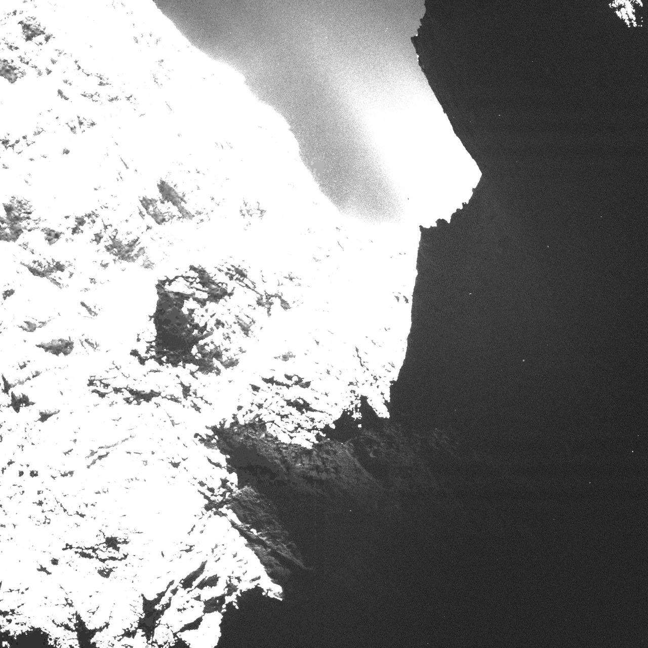 This image of comet 67P/Churyumov-Gerasimenko was obtained on October 30, 2014 by the OSIRIS scientific imaging system on the Rosetta spacecraft. The saturation of the image allows the viewer to see some surface structures on dark side of the comet.