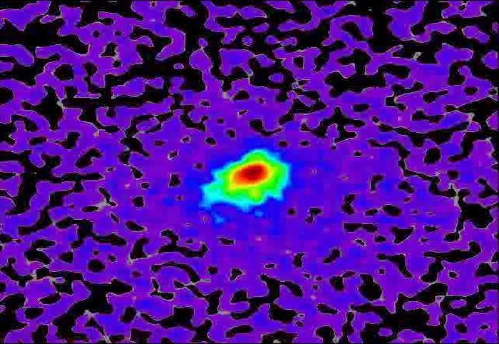 This frame from a movie sequence of images from NASA Mars Reconnaissance Orbiter MRO shows comet C/2013 A1 Siding Spring before and after its close pass by Mars in October 2014. False color enhances subtle variations in brightness in the comet coma.