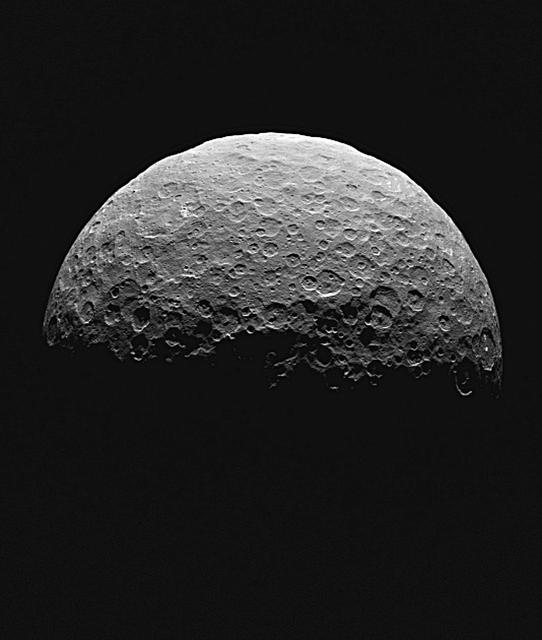 This frame from an animated sequence of images shows northern terrain on the sunlit side of dwarf planet Ceres as seen by NASA Dawn spacecraft on April 14 and 15, 2015.