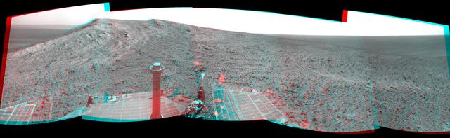 NASA Mars Exploration Rover Opportunity recorded this view of the summit of Cape Tribulation, on the western rim of Endeavour Crater on the day before the rover drove to the top. You need 3D glasses to view this image.