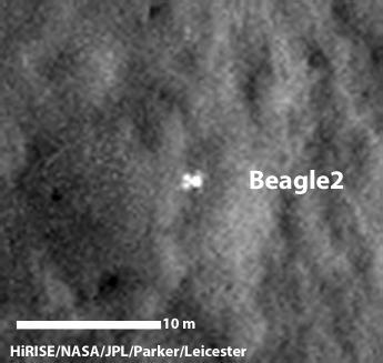 A configuration interpreted as the United Kingdom Beagle 2 Lander, with solar panels at least partially deployed, is indicated in this composite of two images from NASA Mars Reconnaissance Orbiter.